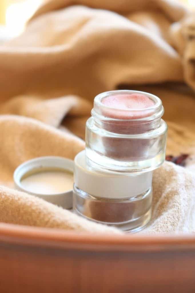 Subtly tinted with natural hibiscus powder, this DIY Tinted Lip Balm is soothing and, most importantly, chemical-free. Perfect for gifts!