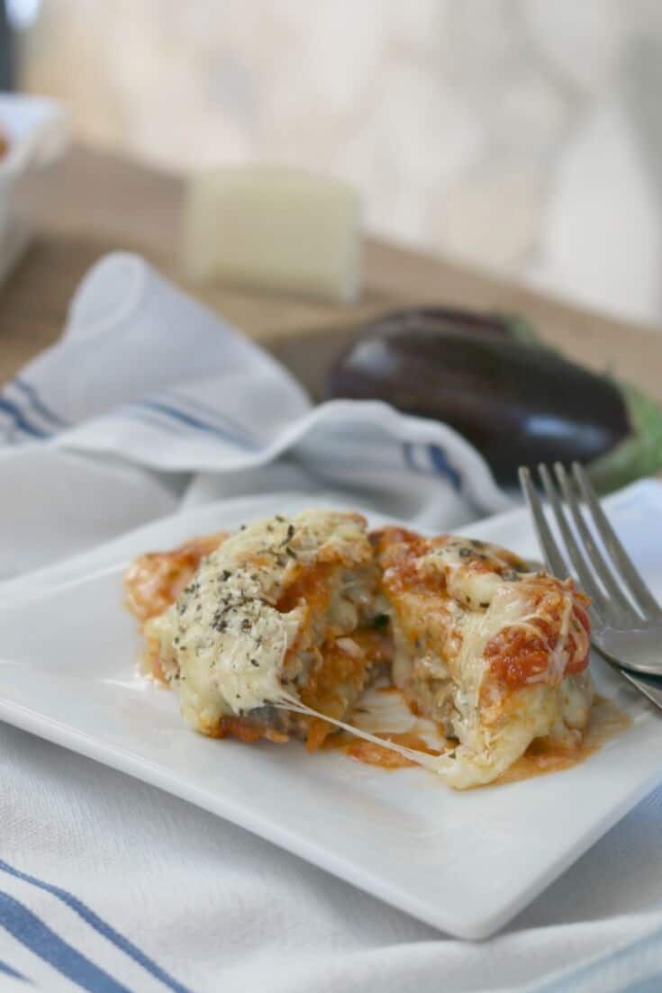 Easy Grain-Free Eggplant Parmesan will be your go-to recipe for Sunday dinner or entertaining. Perfect to save for the holidays. Make this grain-free eggplant Parmesan recipe now, and then save it for your holiday dinners as well. Easy, delicious, and a crowd-pleaser!