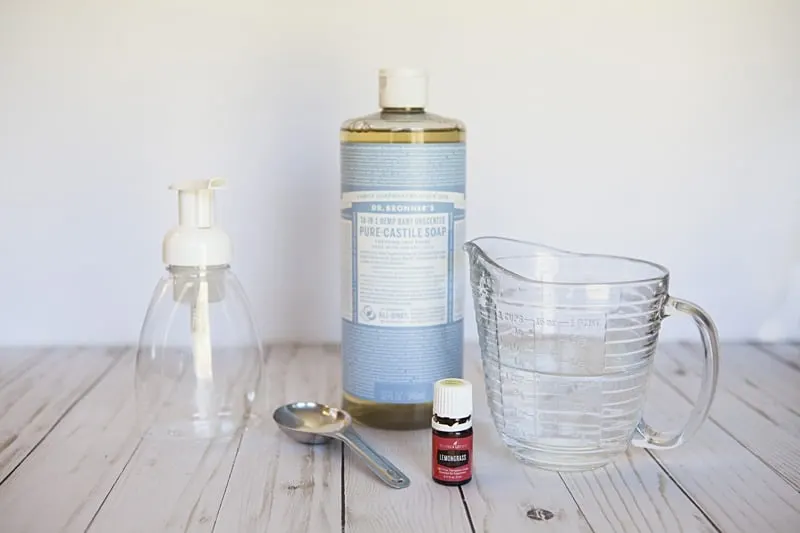 Make this DIY foaming hand soap with three simple ingredients. Once you see how easy it is you won't bother with comparing products in the store. #naturalcleaning #handsoap #essentialoils #soaprecipes #diyproject #greenliving #greencleaning