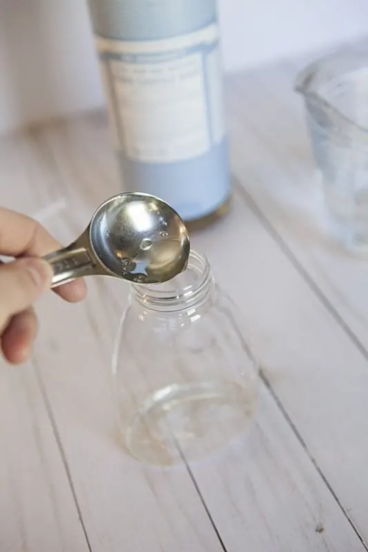 Make this DIY foaming hand soap with three simple ingredients. Once you see how easy it is you won't bother with comparing products in the store. #naturalcleaning #handsoap #essentialoils #soaprecipes #diyproject #greenliving #greencleaning