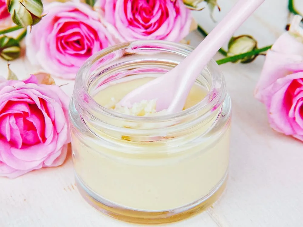 When you learn to make your own homemade lip balm something wonderful happens!  You can stop reading labels and know you’re using a truly natural and safe product on your lips. #DIY #essentialoils #nontoxicDIY