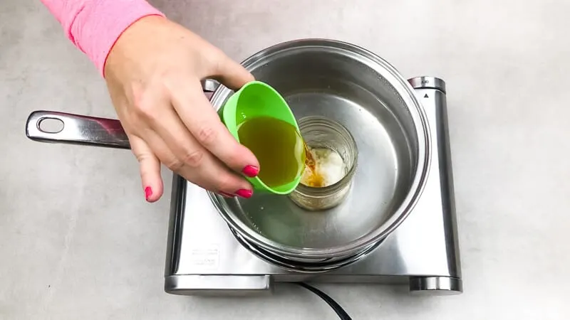 adding the essential oil into the pan