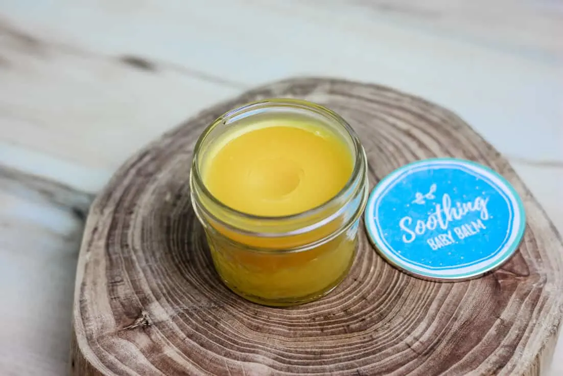shea butter baby balm in jar on table