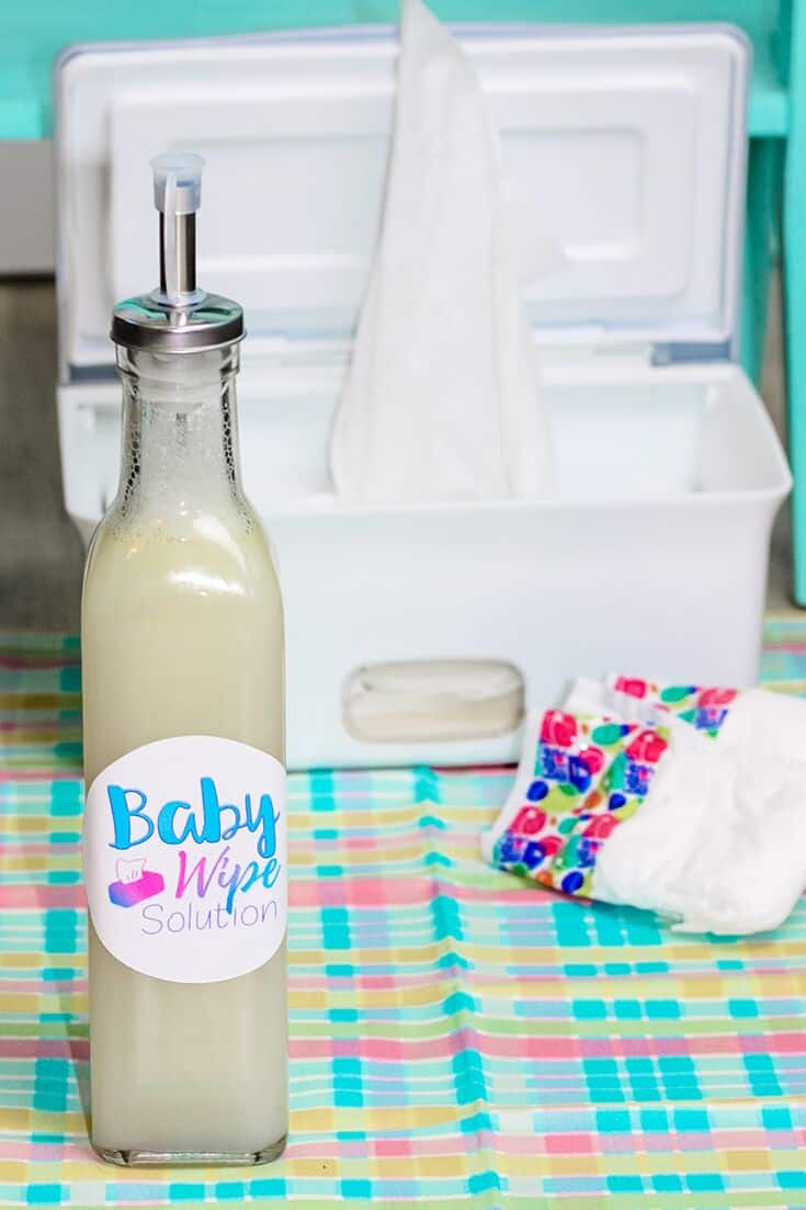 baby wipes solution in bottle on changing table