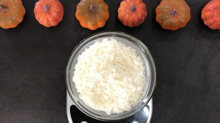 Soy wax being weighed to make Pumpkin spice homemade candle with essential oils