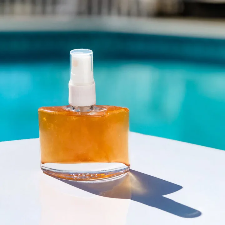 DIY Shimmer Body Oil by Pool