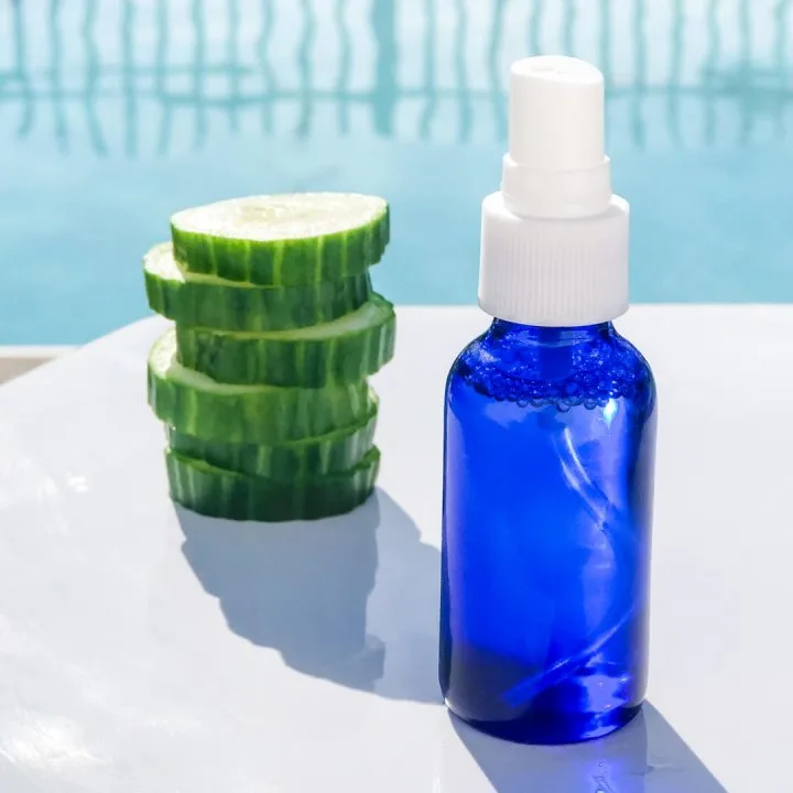 bottle of cucumber micellar water and sliced cucumber
