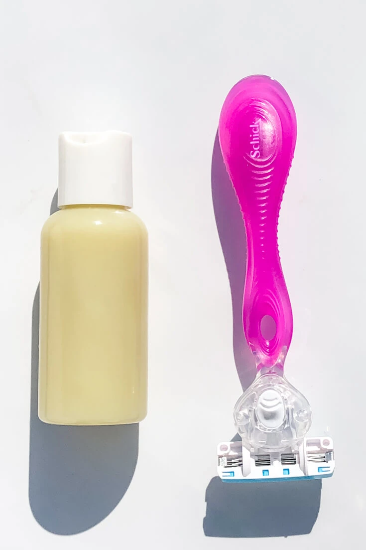 bottle of diy shave butter and women's razor
